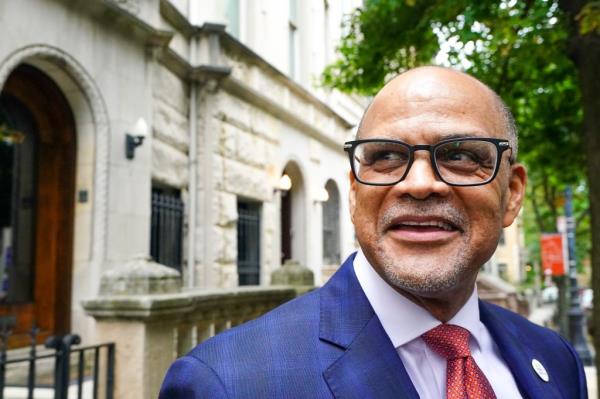 NYC School Chancellor David Banks in a suit and tie, leaving his home in Manhattan